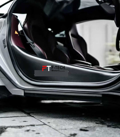 Carbon fiber car wrap with F-Tech Motors logo on a vehicle surface